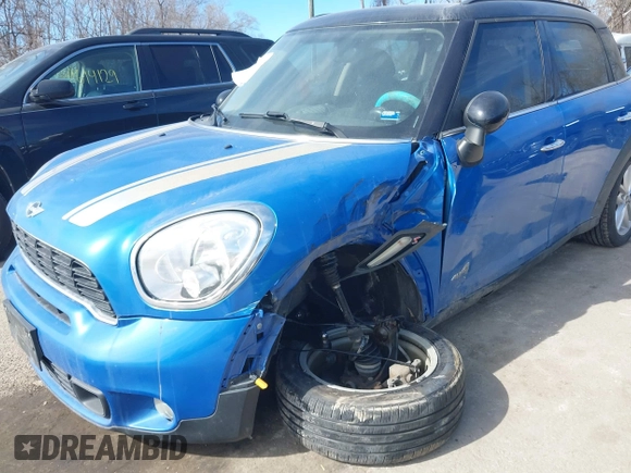2014 MINI Countryman S with VIN WMWZC5C54EWM17299, listed as a IAAI auction lot 41655370 with 104,264 mi miles and . Bid and sale history available at DreamBid. Image 6.