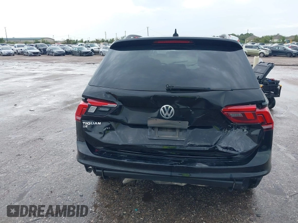 2021 Volkswagen Tiguan SE z VIN 3VV3B7AX7MM004286, wystawiony jako IAAI lot #39864219 z przebiegiem 67 429 mil mil oraz . Historia ofert i sprzedaży dostępna na DreamBid. Obrazek 16.