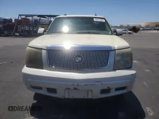 2005 Cadillac Escalade z VIN 1GYEC63T25R181430, wystawiony jako Copart lot #60573205 z przebiegiem 226 012 mil mil oraz Czysty tytuł • Clean title. Historia ofert i sprzedaży dostępna na DreamBid. Obrazek 5.