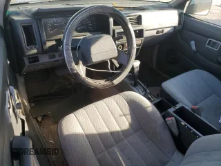 1993 Nissan Frontier z VIN 1N6SD16S7PC353014, wystawiony jako Copart lot #88586865 z przebiegiem 288 557 mil mil oraz Nie do naprawy • Non repairable. Historia ofert i sprzedaży dostępna na DreamBid. Obrazek 8.