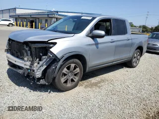 2019 Honda Ridgeline RTL with VIN 5FPYK2F55KB003581, listed as a Copart auction lot 61231815 with 77,166 mi miles and Salvage title. Bid and sale history available at DreamBid. Image 1.