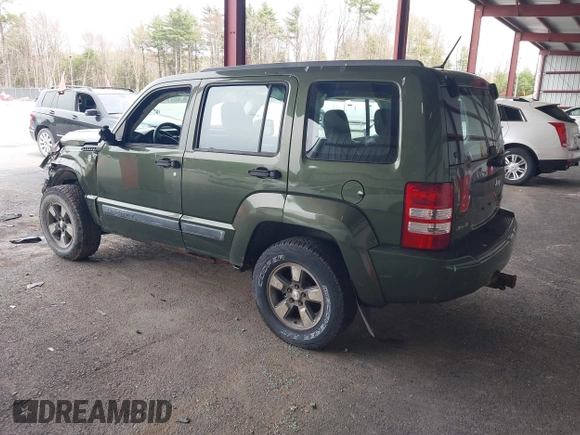2008 Jeep Liberty Sport with VIN 1J8GN28K98W232003, listed as a IAAI auction lot 42127476 with 129,286 mi miles. Bid and sale history available at carsss.com. Image 3.