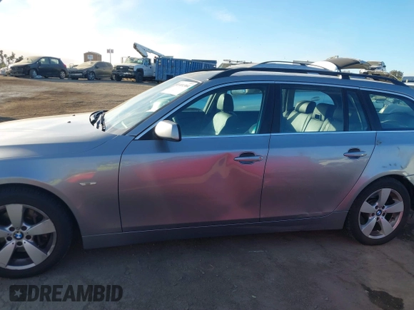 2007 BMW 5 Series 530xi with VIN WBANN73527CN04174, listed as a IAAI auction lot 41401304 with 114,405 mi miles and . Bid and sale history available at DreamBid. Image 14.
