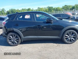 2018 Mazda CX-3 Touring z VIN JM1DKFC73J0321605, wystawiony jako IAAI lot #42355269 z przebiegiem 40 053 mil mil oraz . Historia ofert i sprzedaży dostępna na DreamBid. Obrazek 13.
