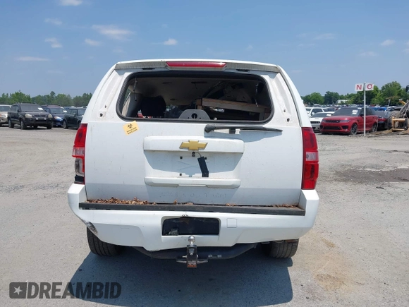 2013 Chevrolet Tahoe Commercial with VIN 1GNLC2E08DR216213, listed as a IAAI auction lot 37406061 with Not provided miles and . Bid and sale history available at DreamBid. Image 16.