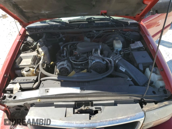 2003 GMC Sonoma SLS z VIN 1GTCS19X138192032, wystawiony jako Copart lot #76230394 z przebiegiem 116 046 mil mil oraz Szkoda całkowita • Salvage title. Historia ofert i sprzedaży dostępna na DreamBid. Obrazek 12.