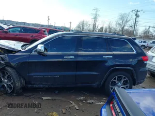 2019 Jeep Grand Cherokee Overland with VIN 1C4RJFCGXKC688543, listed as a IAAI auction lot 41643678 with 65,182 mi miles. Bid and sale history available at carsss.com. Image 15.