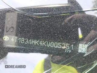 2019 Toyota Camry Hybrid LE z VIN 4T1B31HK4KU005351, wystawiony jako IAAI lot #42162802 z przebiegiem 89 187 mil mil oraz . Historia ofert i sprzedaży dostępna na DreamBid. Obrazek 9.