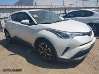2019 Toyota C-HR XLE with VIN JTNKHMBX7K1023674, listed as a IAAI auction lot 42021152 with 106,450 mi miles. Bid and sale history available at carsss.com. Image 1.