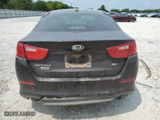 2015 Kia Optima LX with VIN 5XXGM4A73FG358013, listed as a Copart auction lot 82112314 with 135,264 mi miles and Salvage Title. Bid and sale history available at carsss.com. Image 6.