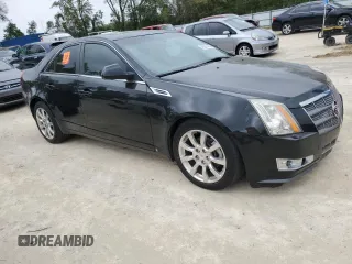 2009 Cadillac CTS AWD w/1SA with VIN 1G6DH577590123416, listed as a Copart auction lot 48297495 with 142,728 mi miles and Salvage Title. Bid and sale history available at carsss.com. Image 4.