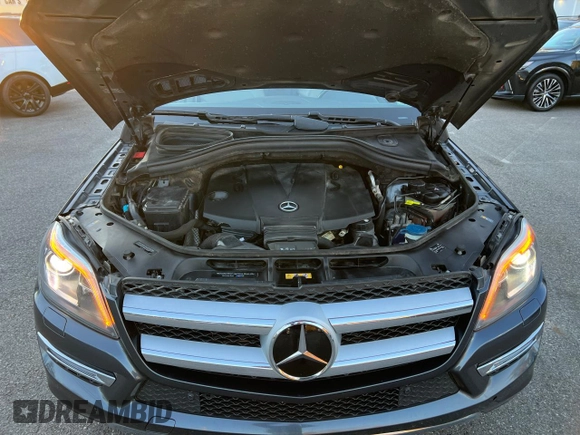 2016 Mercedes-Benz GL with VIN 4JGDF2EEXGA682823, listed as a Copart auction lot 82710124 with 216,598 mi miles and Clean Title. Bid and sale history available at carsss.com. Image 8.