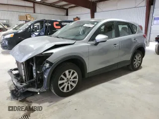 2014 Mazda CX-5 Sport with VIN JM3KE4BE4E0419882, listed as a Copart auction lot 53896815 with 127,428 mi miles and Salvage Title. Bid and sale history available at carsss.com. Image 1.