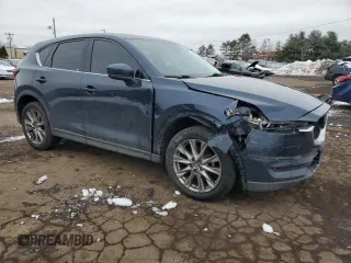 2019 Mazda CX-5 Grand Touring with VIN JM3KFBDM6K0667925, listed as a Copart auction lot 44657565 with 71,359 mi miles and Salvage Title. Bid and sale history available at carsss.com. Image 4.