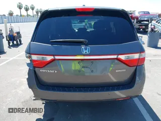 2012 Honda Odyssey Touring with VIN 5FNRL5H98CB011297, listed as a IAAI auction lot 42207061 with 154,073 mi miles and . Bid and sale history available at DreamBid. Image 16.