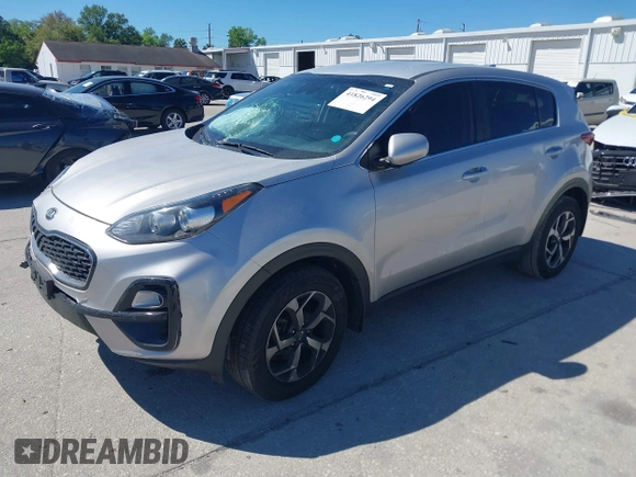 2020 Kia Sportage LX with VIN KNDPMCAC6L7742024, listed as a IAAI auction lot 41826294 with 67,359 mi miles. Bid and sale history available at carsss.com. Image 20.