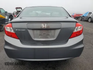 2012 Honda Civic LX z VIN 2HGFB2F50CH324974, wystawiony jako Copart lot #57442305 z przebiegiem 124 462 mil mil oraz Szkoda całkowita • Salvage title. Historia ofert i sprzedaży dostępna na DreamBid. Obrazek 6.