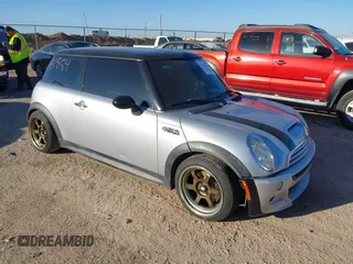 2006 MINI Hardtop S with VIN WMWRE33506TN25789, listed as a IAAI auction lot 41674426 with 108,542 mi miles and . Bid and sale history available at DreamBid. Image 1.