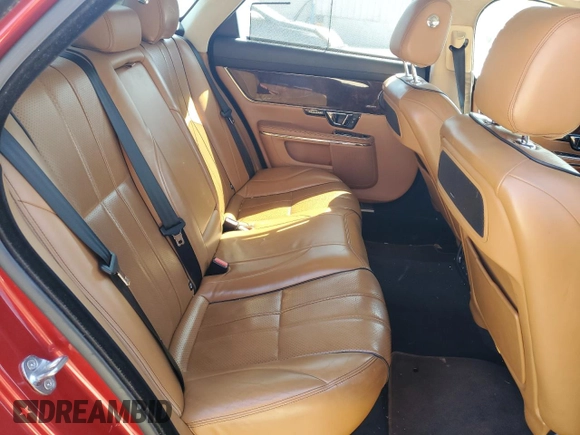 2015 Jaguar XJ Portfolio z VIN SAJWJ2GD9F8V90013, wystawiony jako Copart lot #49766095 z przebiegiem 179 970 mil mil oraz Czysty tytuł • Clean title. Historia ofert i sprzedaży dostępna na DreamBid. Obrazek 10.