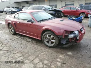 1999 Ford Mustang GT with VIN 1FAFP42XXXF100630, listed as a Copart auction lot 85198374 with 151,356 mi miles and Salvage Title. Bid and sale history available at carsss.com. Image 4.