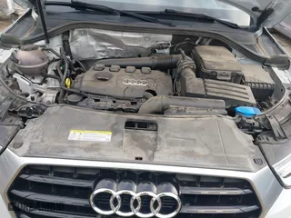 2018 Audi Q3 Premium with VIN WA1BCCFSXJR028356, listed as a IAAI auction lot 41761544 with 82,877 mi miles. Bid and sale history available at carsss.com. Image 10.