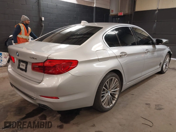 2018 BMW 5 Series 540i xDrive with VIN WBAJE7C53JWD52669, listed as a IAAI auction lot 41634800 with 89,829 mi miles and . Bid and sale history available at DreamBid. Image 4.