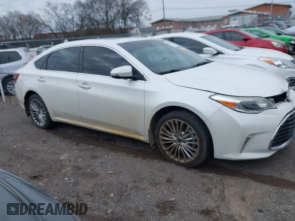 2016 Toyota Avalon Limited with VIN 4T1BK1EB6GU201211, listed as a IAAI auction lot 41599051 with 211,533 mi miles and . Bid and sale history available at carsss.com. Image 13.