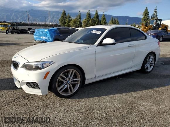 2015 BMW 2 Series 228i with VIN WBA1F9C54FVW98698, listed as a Copart auction lot 47660115 with 91,221 mi miles and Salvage Title. Bid and sale history available at carsss.com. Image 1.