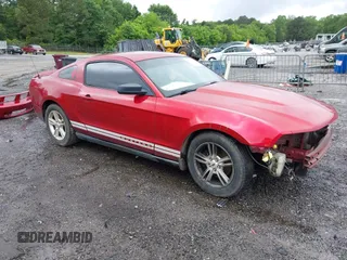 2012 Ford Mustang Premium with VIN 1ZVBP8AM6C5260105, listed as a IAAI auction lot 42244372 with 227,704 mi miles and . Bid and sale history available at DreamBid. Image 1.