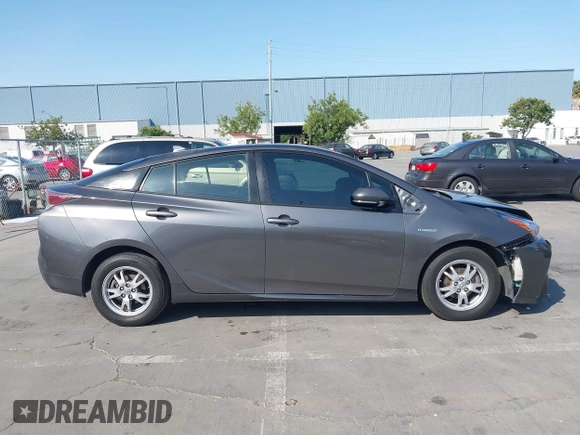 2016 Toyota Prius Two z VIN JTDKBRFU9G3507845, wystawiony jako IAAI lot #42410176 z przebiegiem 187 220 mil mil oraz . Historia ofert i sprzedaży dostępna na DreamBid. Obrazek 13.