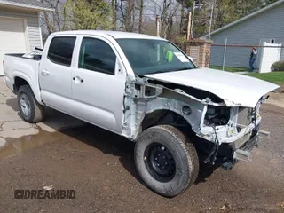 2022 Toyota Tacoma SR with VIN 3TMCZ5AN0NM491295, listed as a IAAI auction lot 41886284 with 36,305 mi miles and . Bid and sale history available at DreamBid. Image 1.