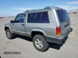 2000 Jeep Cherokee SE with VIN 1J4FF27SXYL140055, listed as a Copart auction lot 70315454 with 176,017 mi miles and Salvage title. Bid and sale history available at DreamBid. Image 2.