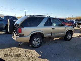 1999 Chevrolet Blazer LS с VIN 1GNCT18W1XK140616, выставлен на аукционе Copart как лот 78567434 с пробегом 244 356 миль миль и Чистый • Clean title. История ставок и продаж доступна на DreamBid. Изображение 3.