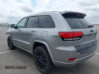 2017 Jeep Grand Cherokee Laredo with VIN 1C4RJFAG1HC701921, listed as a IAAI auction lot 42164963 with 135,039 mi miles and . Bid and sale history available at DreamBid. Image 3.