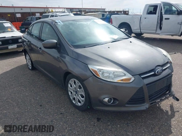 2012 Ford Focus SE with VIN 1FAHP3F28CL445832, listed as a IAAI auction lot 42380266 with 164,884 mi miles and . Bid and sale history available at DreamBid. Image 1.