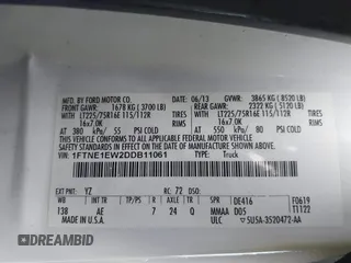 2013 Ford Econoline Cargo Commercial with VIN 1FTNE1EW2DDB11061, listed as a IAAI auction lot 41808318 with 230,677 mi miles. Bid and sale history available at carsss.com. Image 9.