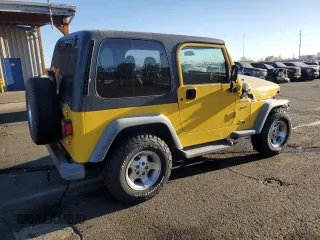 2002 Jeep Wrangler Sport with VIN 1J4FA49S52P750310, listed as a Copart auction lot 50815255 with 188,364 mi miles and Salvage Title. Bid and sale history available at carsss.com. Image 3.