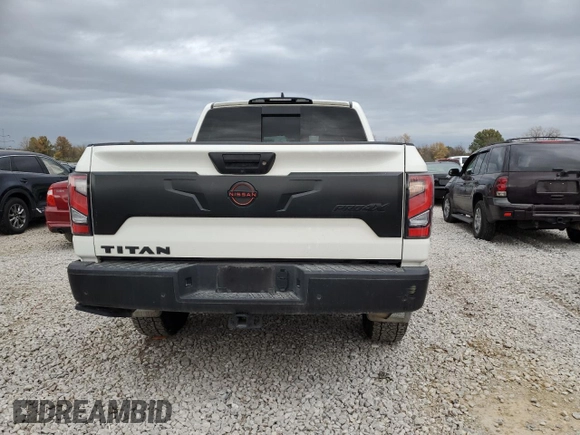 2023 Nissan Titan SV z VIN 1N6AA1ED7PN116504, wystawiony jako Copart lot #77986734 z przebiegiem 31 392 mil mil oraz Szkoda całkowita • Salvage title. Historia ofert i sprzedaży dostępna na DreamBid. Obrazek 6.
