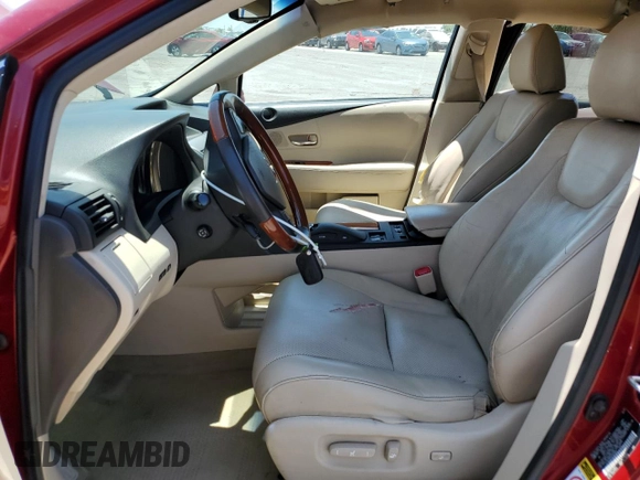 2010 Lexus RX 450h with VIN JTJZB1BA5A2400054, listed as a Copart auction lot 63348865 with 177,153 mi miles and Salvage title. Bid and sale history available at DreamBid. Image 7.