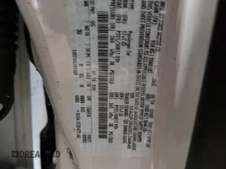 2014 Ford Focus Electric z VIN 1FADP3R45EL344648, wystawiony jako Copart lot #57118335 z przebiegiem 60 347 mil mil oraz Szkoda całkowita • Salvage title. Historia ofert i sprzedaży dostępna na DreamBid. Obrazek 12.