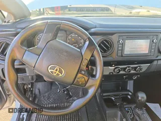 2016 Toyota Tacoma SR with VIN 5TFRX5GN2GX067461, listed as a IAAI auction lot 42731292 with 135,105 mi miles and . Bid and sale history available at DreamBid. Image 7.