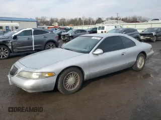 1997 Lincoln Mark VIII with VIN 1LNLM91V6VY688798, listed as a Copart auction lot 46725575 with 88,286 mi miles and Salvage Title. Bid and sale history available at DreamBid. Image 1.