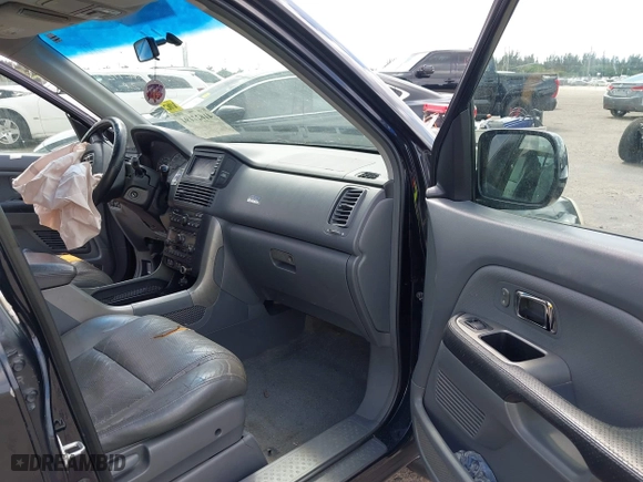 2005 Honda Pilot EX-L with NAVI with VIN 2HKYF18715H562492, listed as a IAAI auction lot 41627194 with 184,653 mi miles. Bid and sale history available at carsss.com. Image 5.