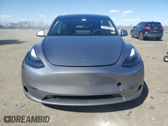 2025 Tesla Model Y Long Range with VIN 7SAYGDED0SF247561, listed as a Copart auction lot 50736875 with 9,094 mi miles and Salvage Title. Bid and sale history available at DreamBid. Image 5.