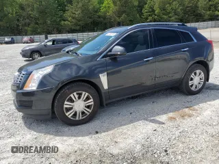 2015 Cadillac SRX Luxury Collection z VIN 3GYFNBE31FS598363, wystawiony jako Copart lot #55766975 z przebiegiem 62 103 mil mil oraz Szkody całkowita. Historia ofert i sprzedaży dostępna na DreamBid. Obrazek 1.