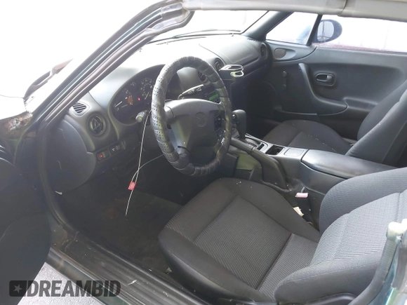 1999 Mazda MX-5 Miata with VIN JM1NB3530X0133971, listed as a IAAI auction lot 42652996 with 19,270 mi miles and . Bid and sale history available at DreamBid. Image 5.