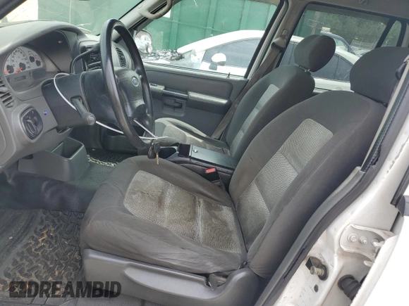 2005 Ford Explorer Sport Trac XLS with VIN 1FMZU67K85UA59170, listed as a Copart auction lot 54472775 with 227,225 mi miles and Salvage title. Bid and sale history available at DreamBid. Image 7.