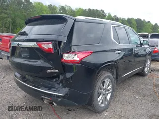 2020 Chevrolet Traverse High Country with VIN 1GNERNKW3LJ186049, listed as a IAAI auction lot 42010235 with 125,847 mi miles and . Bid and sale history available at DreamBid. Image 4.