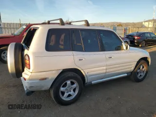1999 Toyota RAV4 with VIN JT3GP10VXX7053225, listed as a Copart auction lot 87920975 with 228,943 mi miles and Salvage Title. Bid and sale history available at DreamBid. Image 3.