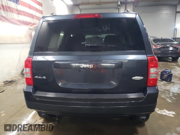 2014 Jeep Patriot Latitude with VIN 1C4NJRFB0ED588336, listed as a Copart auction lot 89391695 with 133,941 mi miles and Salvage Title. Bid and sale history available at carsss.com. Image 6.